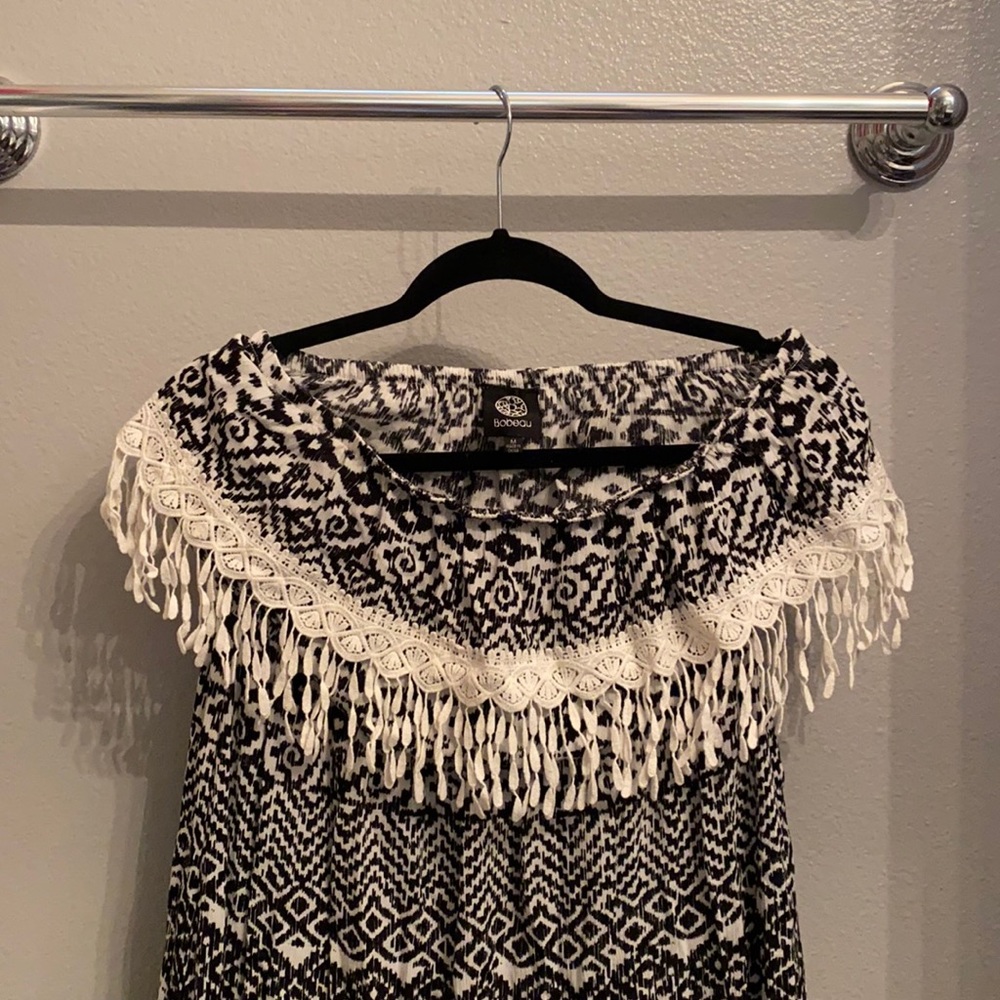 Black and white sleeveless dress with fringe